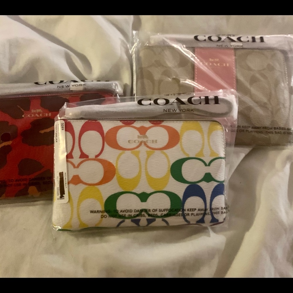 Coach Wristlets different patterns.